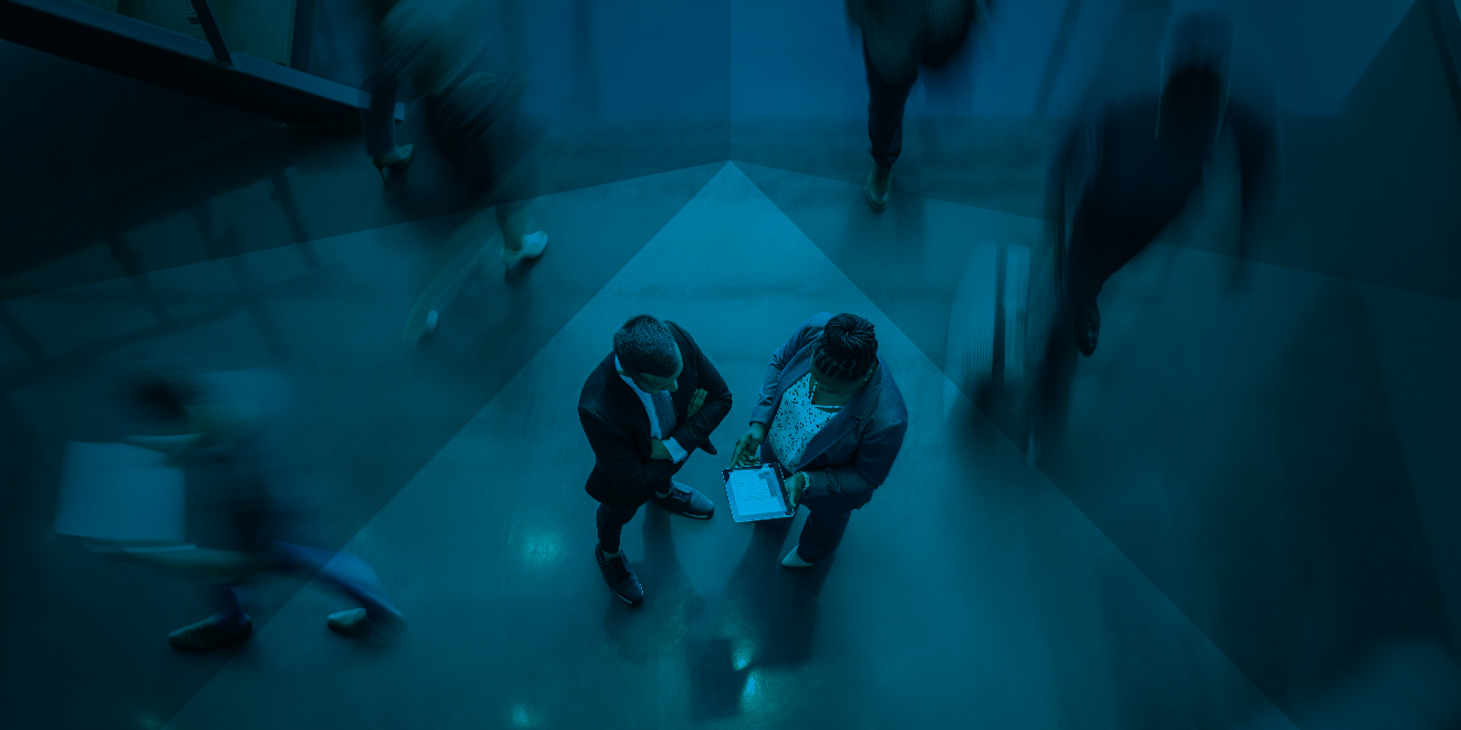 Two leaders in a business setting.